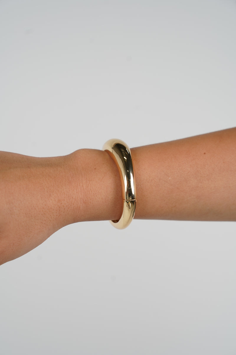Norella Bracelet – Classic Gold-Tone Hinged Bangle for Timeless Elegance