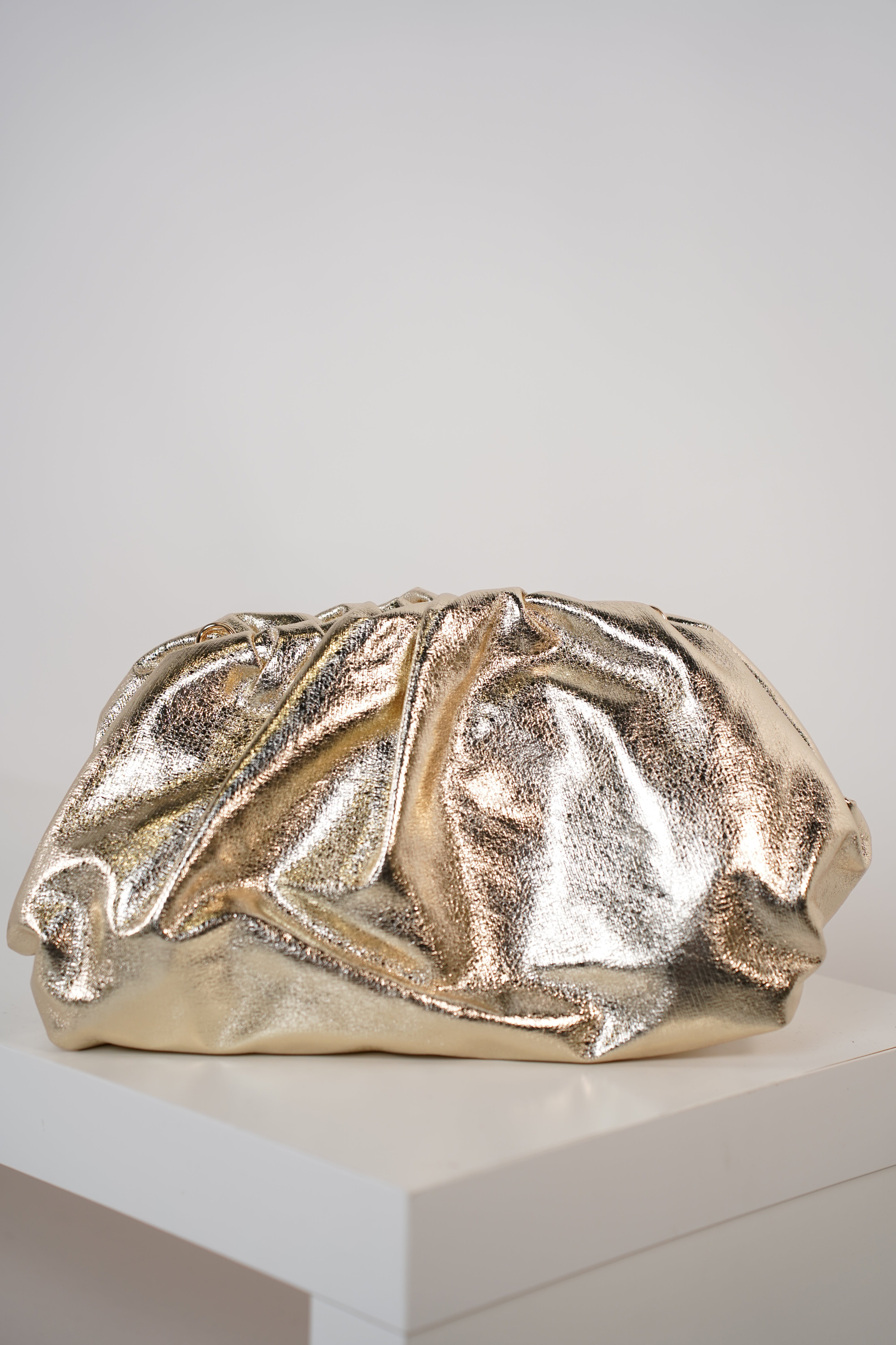 Noeline Soft Clutch – Metallic Ruched Statement Bag