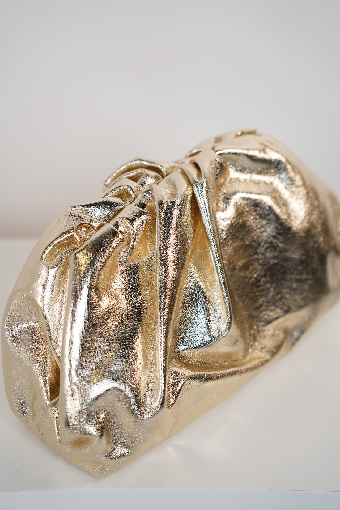Noeline Soft Clutch – Metallic Ruched Statement Bag