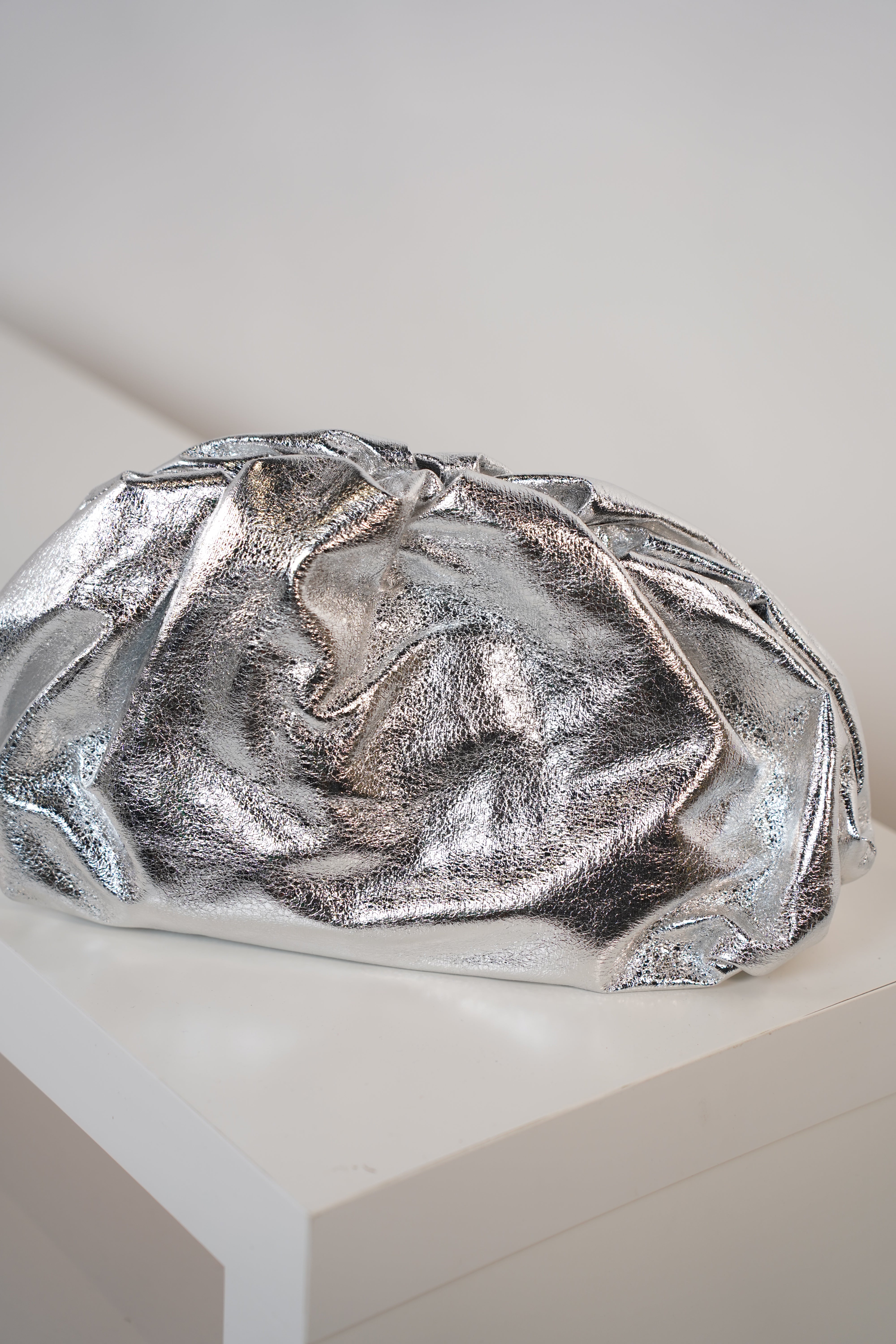 Noeline Soft Clutch – Metallic Ruched Statement Bag