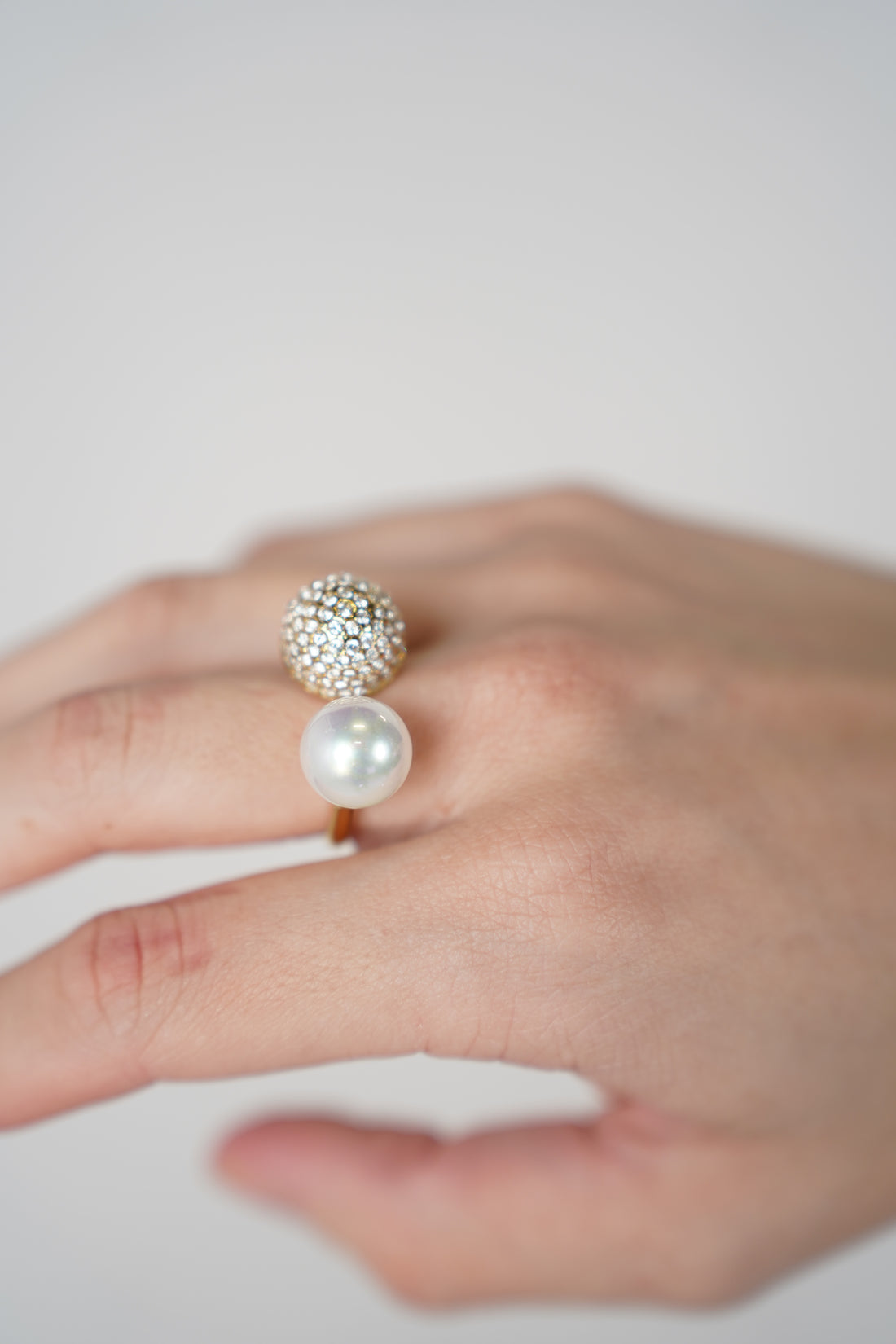 Tanel Pearl Ring – Dual Sphere Pavé & Pearl Statement Band