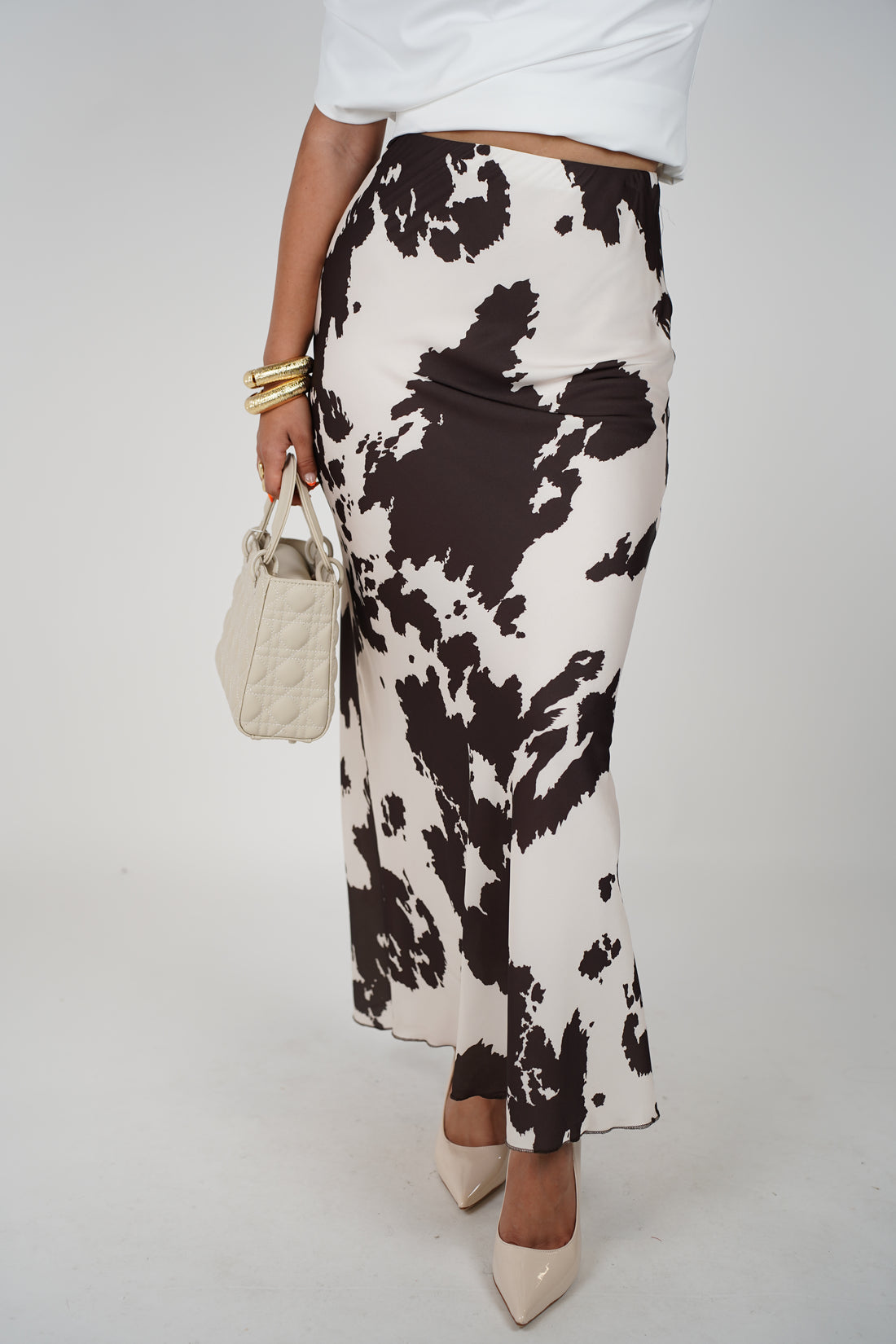 Juliana Cow Satin Abstract Midi Skirt – Neutral Print with Flowy Silhouette