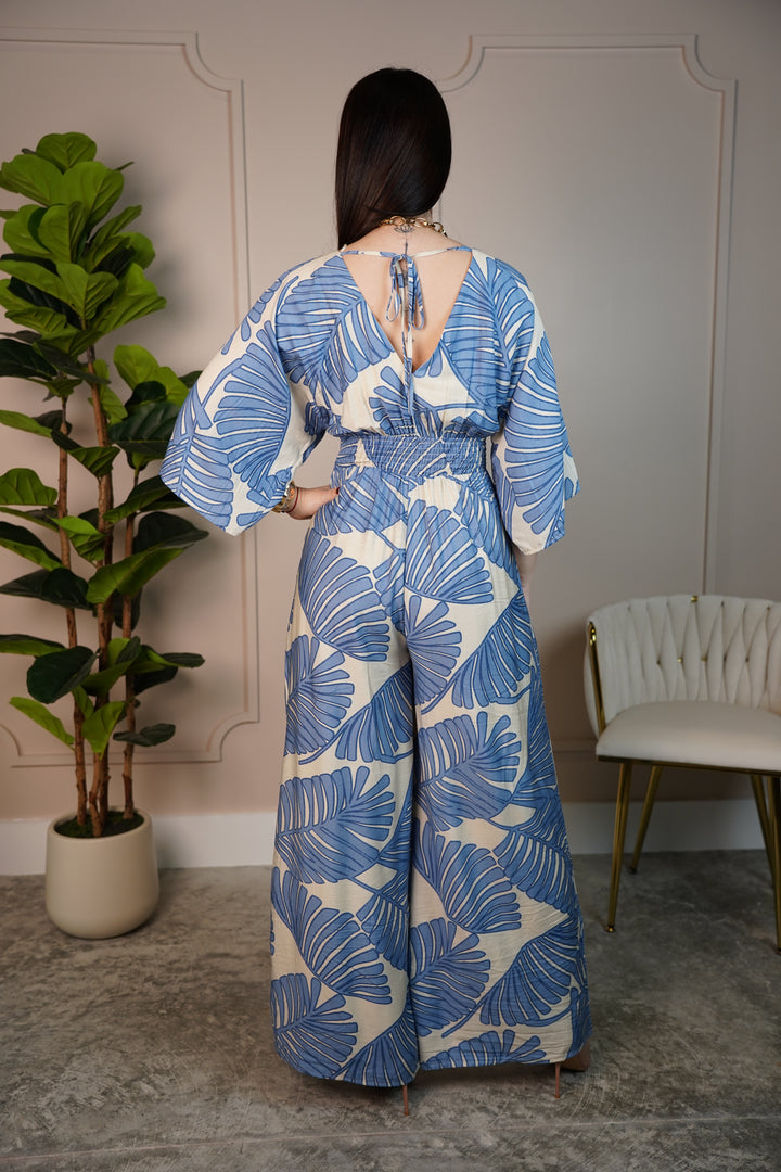 Raquel Tropical Leaf Print Wide-Leg Jumpsuit – Wrap Style, Lightweight & Resort-Ready - Carema Boutique
