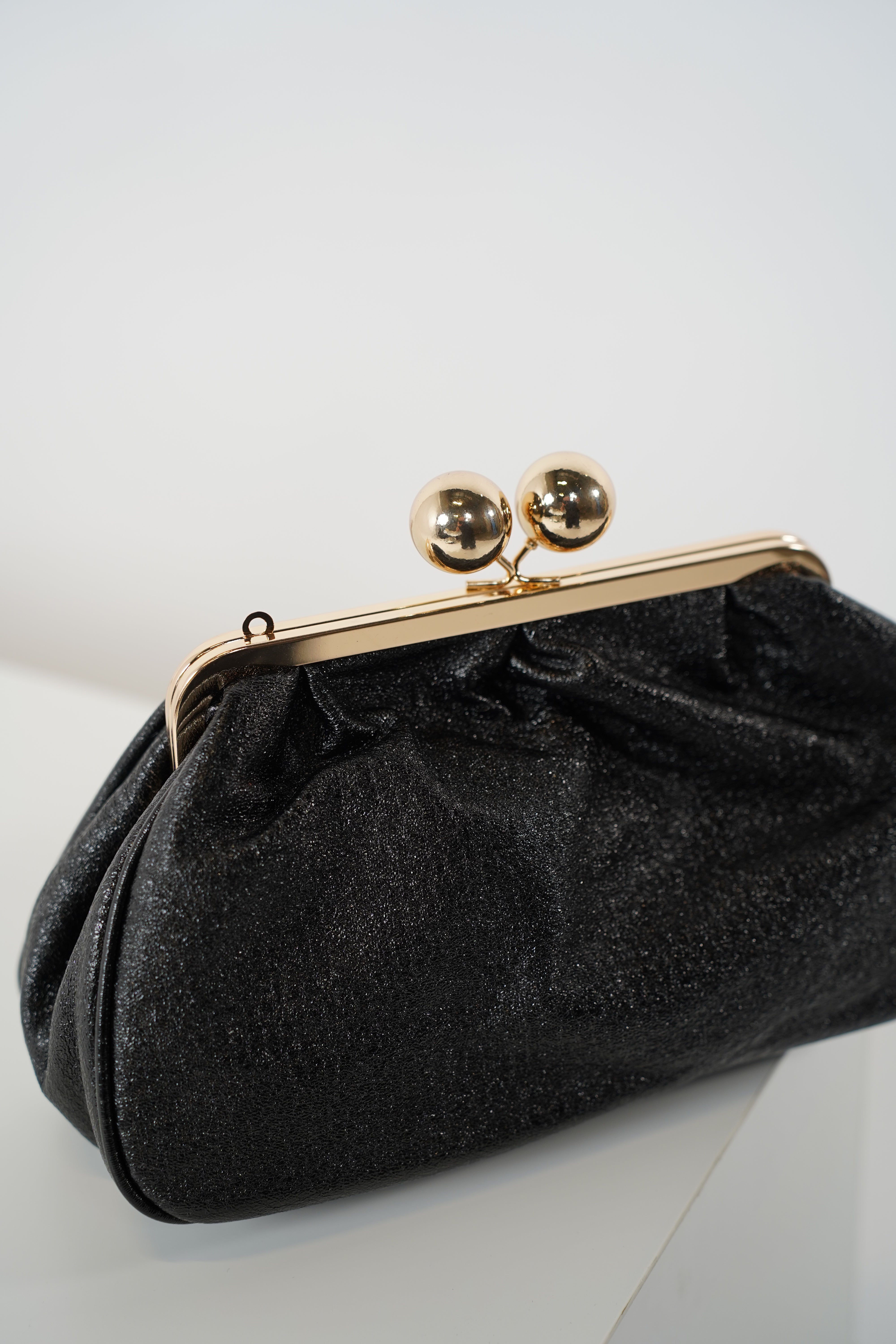 Elexia Metallic Clasp Clutch – Classic Glamour Meets Modern Minimalism