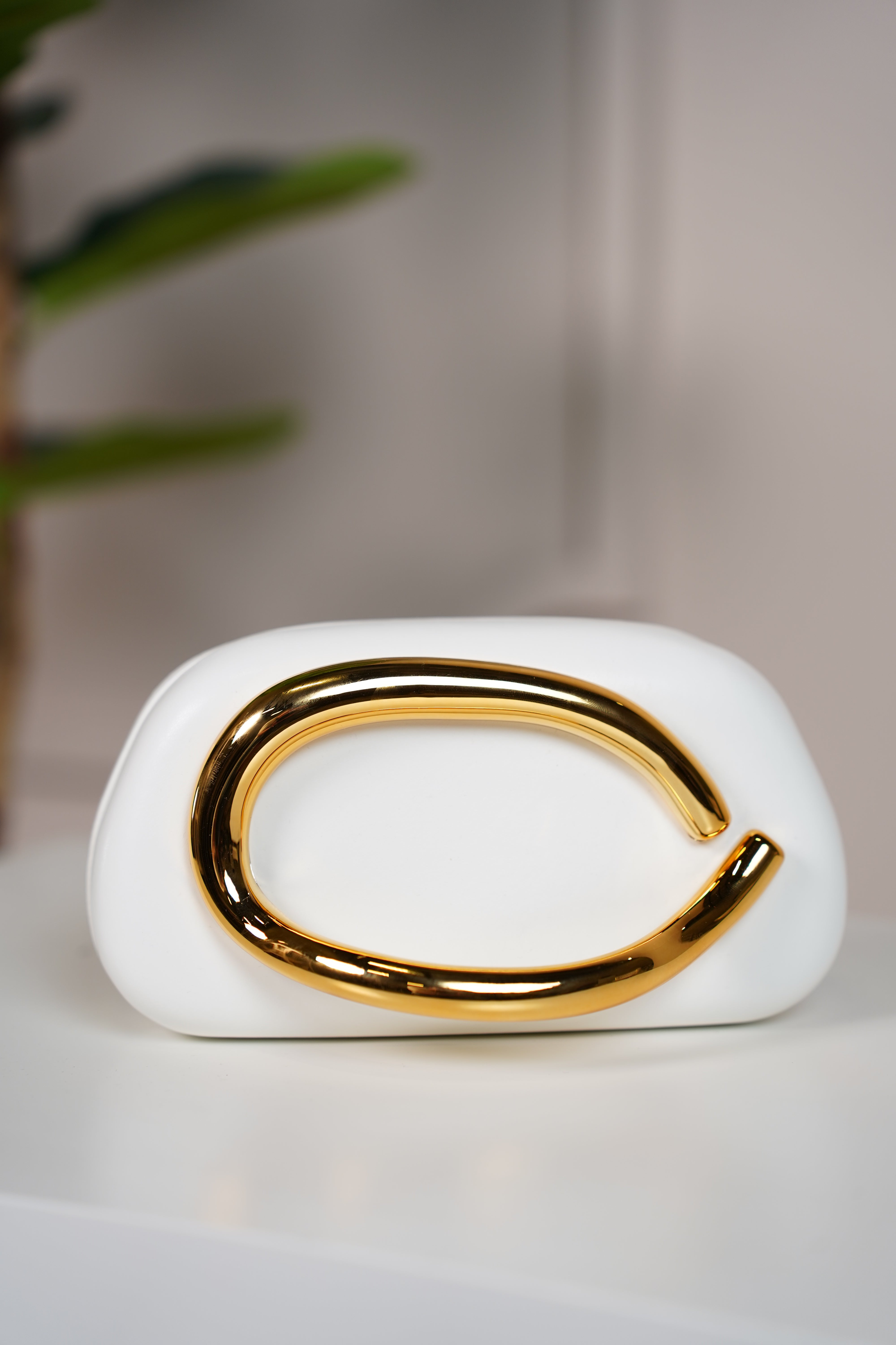 Zalia Trendy Clutch – Sculptural Elegance with a Bold Gold Accent