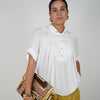 Jeyra Flaca Top – Draped Black Blouse with Modern Ease