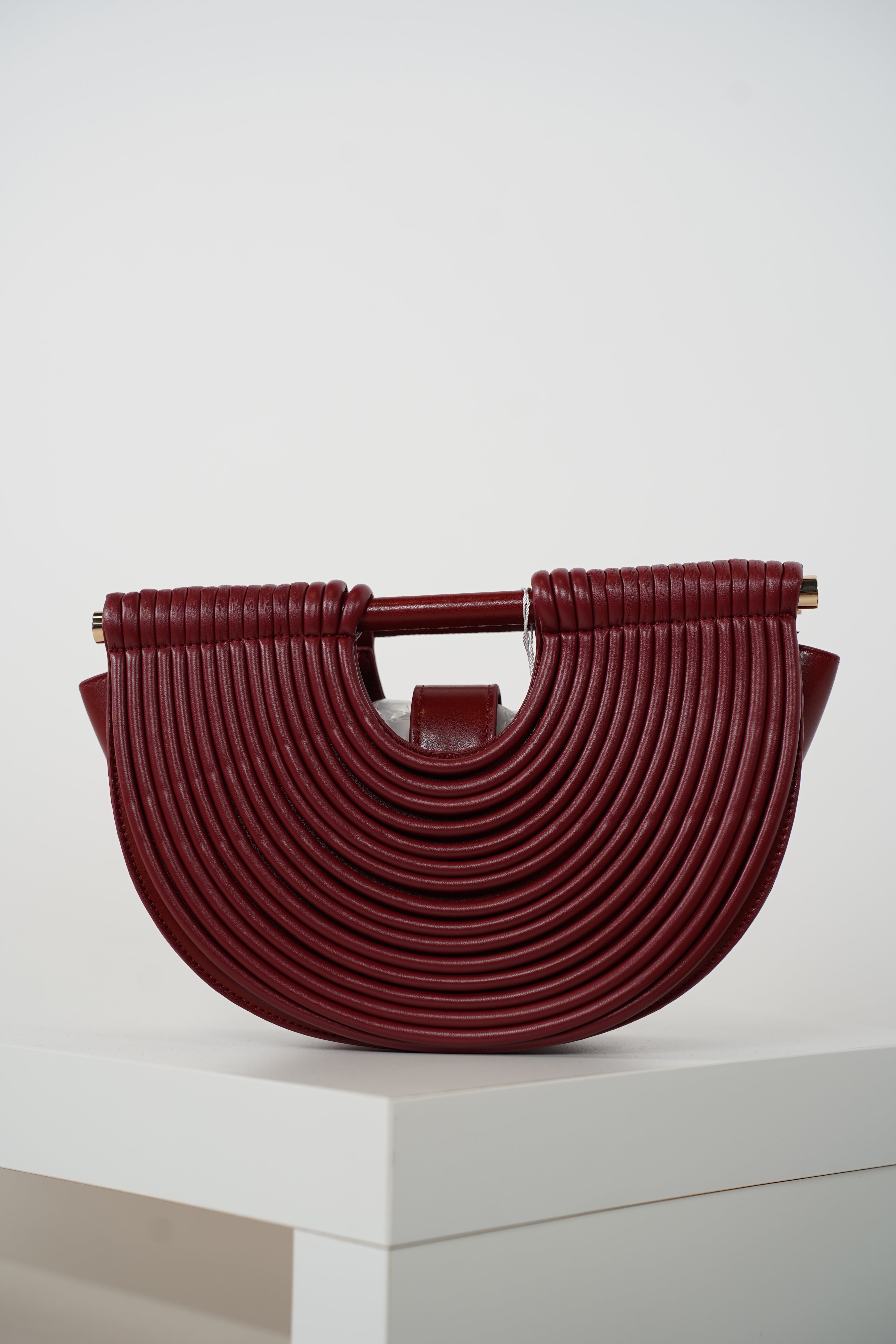 Osiris Clutch – Sculptural Half-Moon Bag
