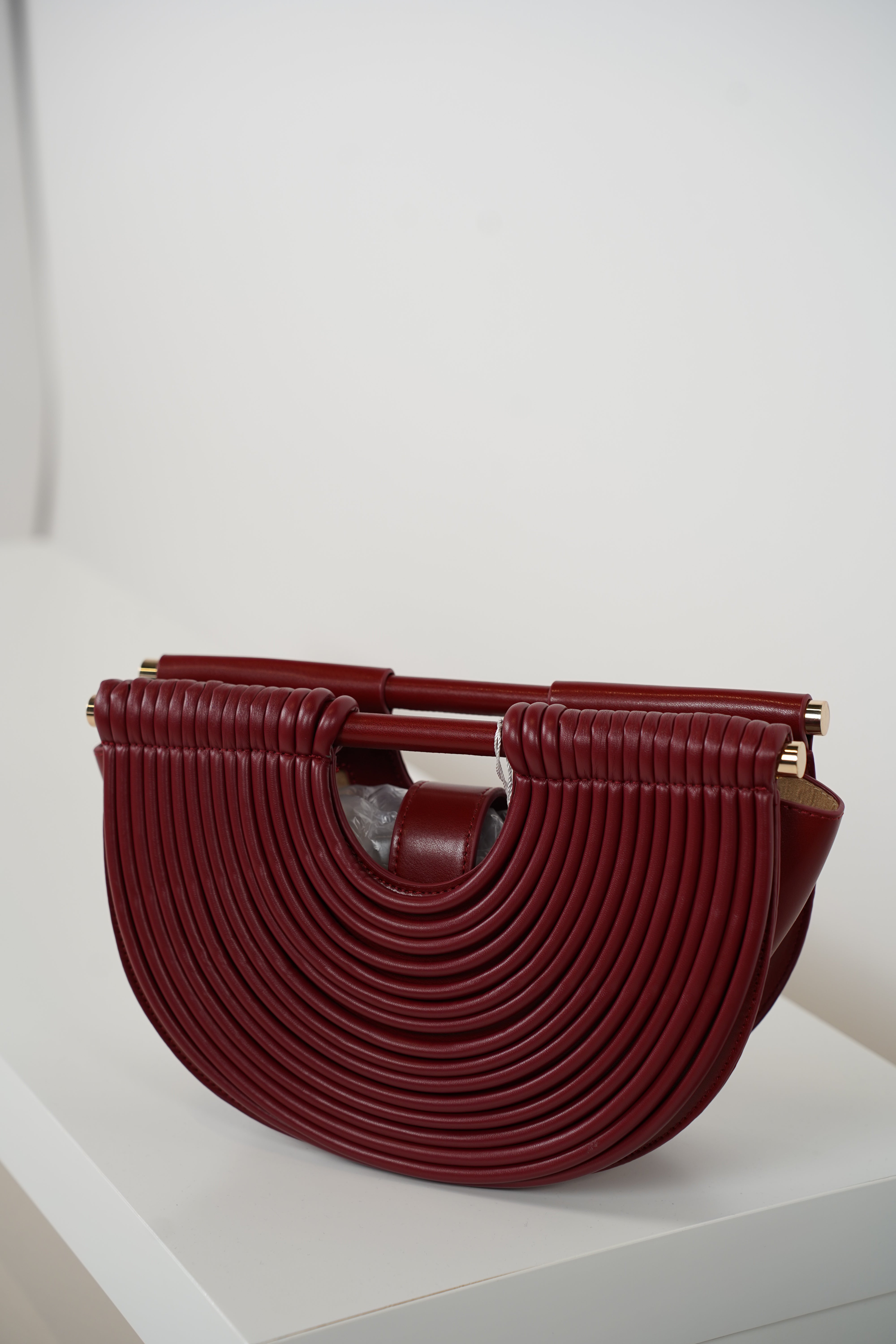 Osiris Clutch – Sculptural Half-Moon Bag