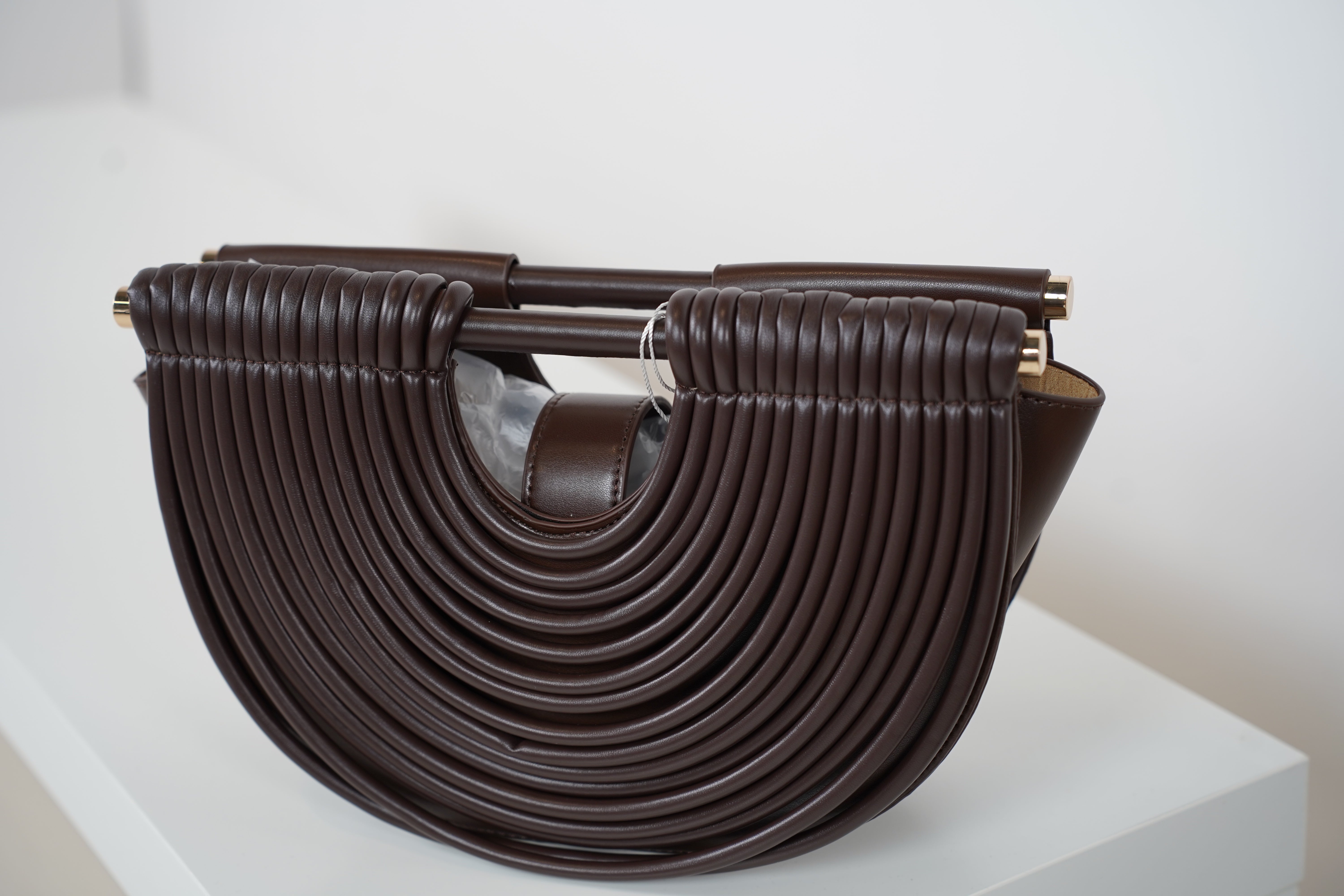 Osiris Clutch – Sculptural Half-Moon Bag