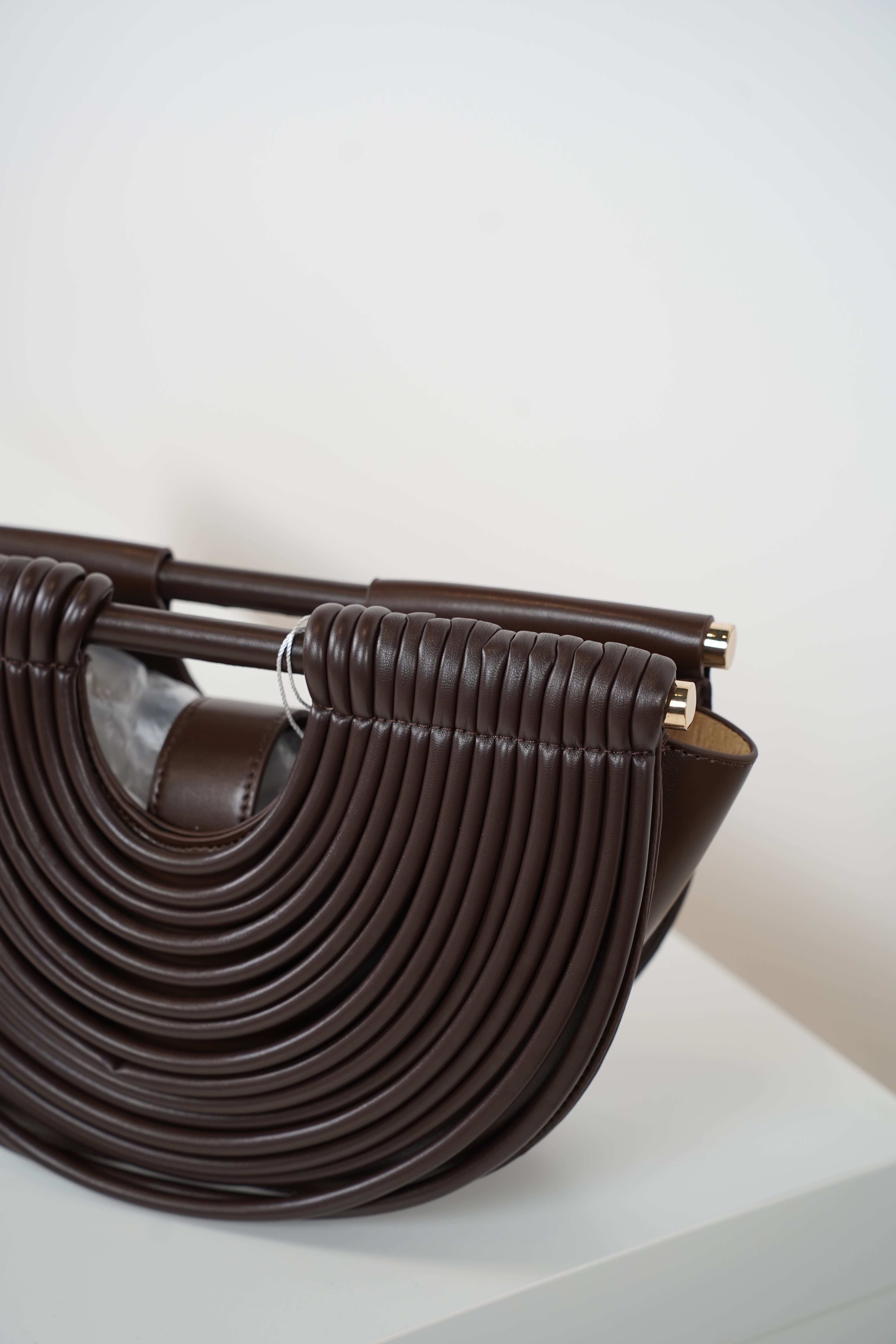 Osiris Clutch – Sculptural Half-Moon Bag