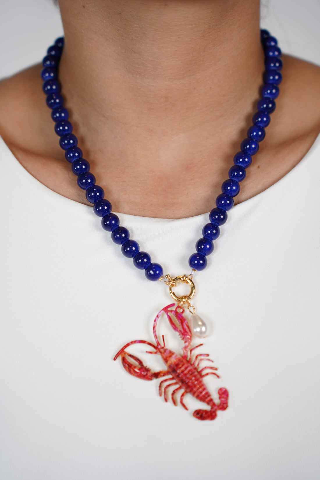 Marzel Lobster Necklace – Bold Coastal Charm in Cobalt Beads
