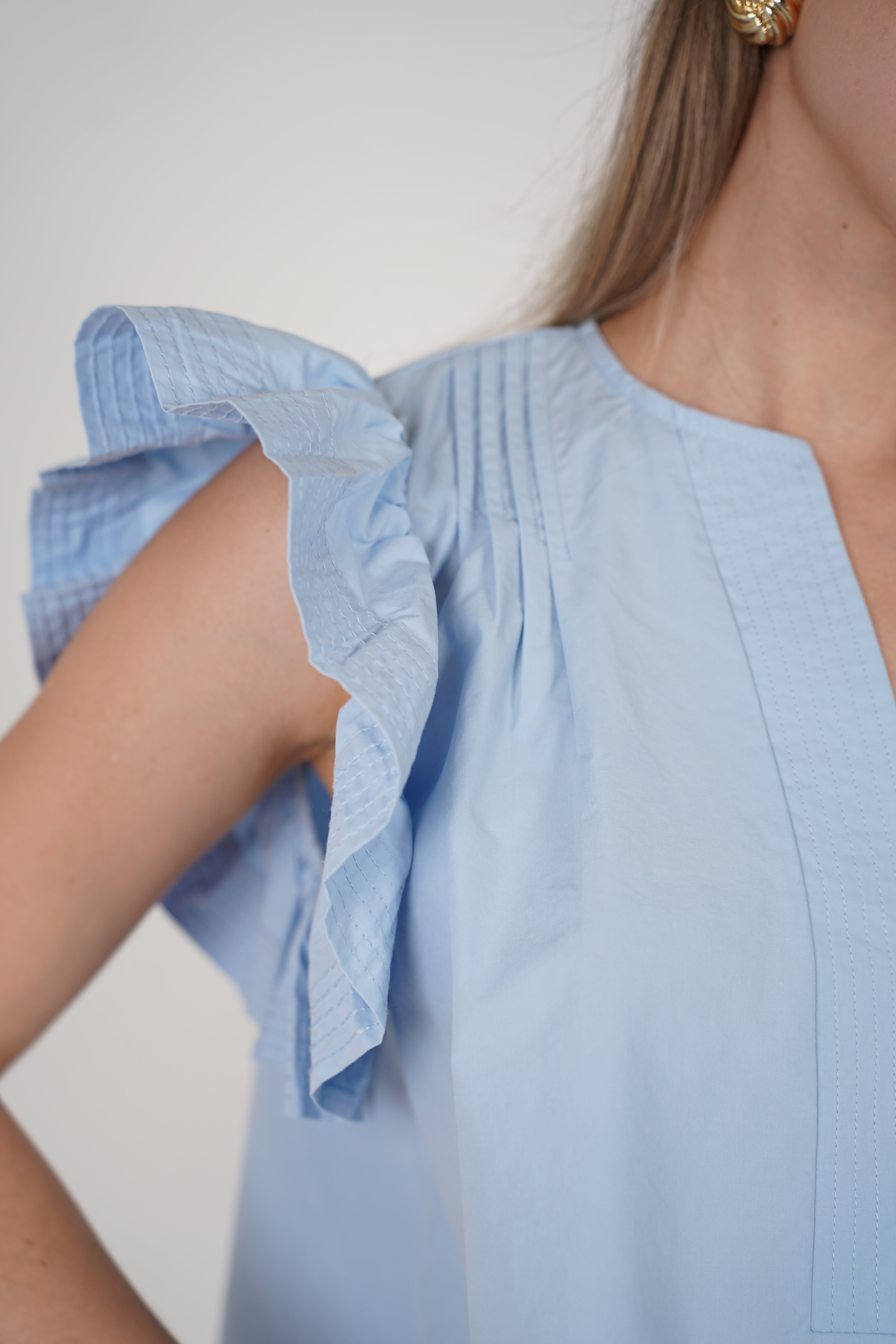 Delyra Top – Soft Blue Ruffle Sleeve Blouse