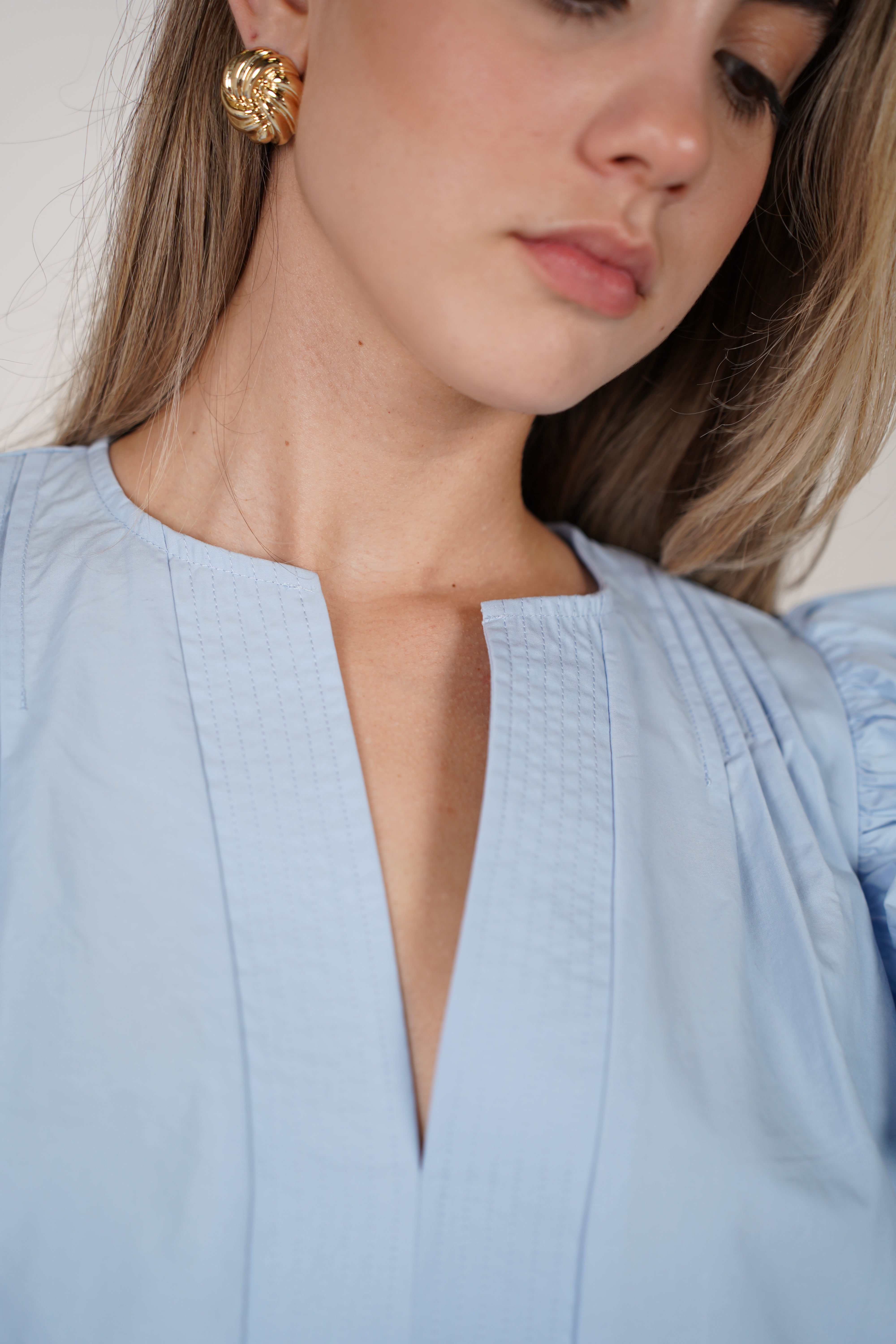 Delyra Top – Soft Blue Ruffle Sleeve Blouse