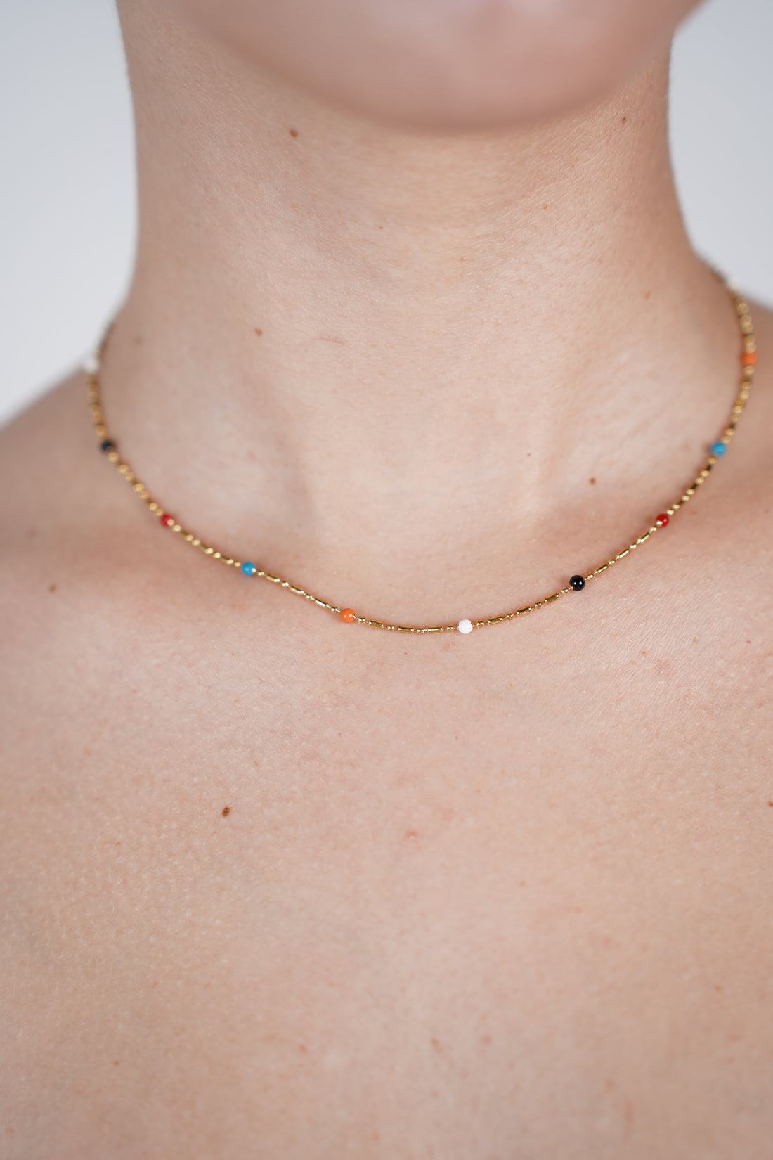 Kiva Necklace – Delicate Gold Chain with Colorful Beads