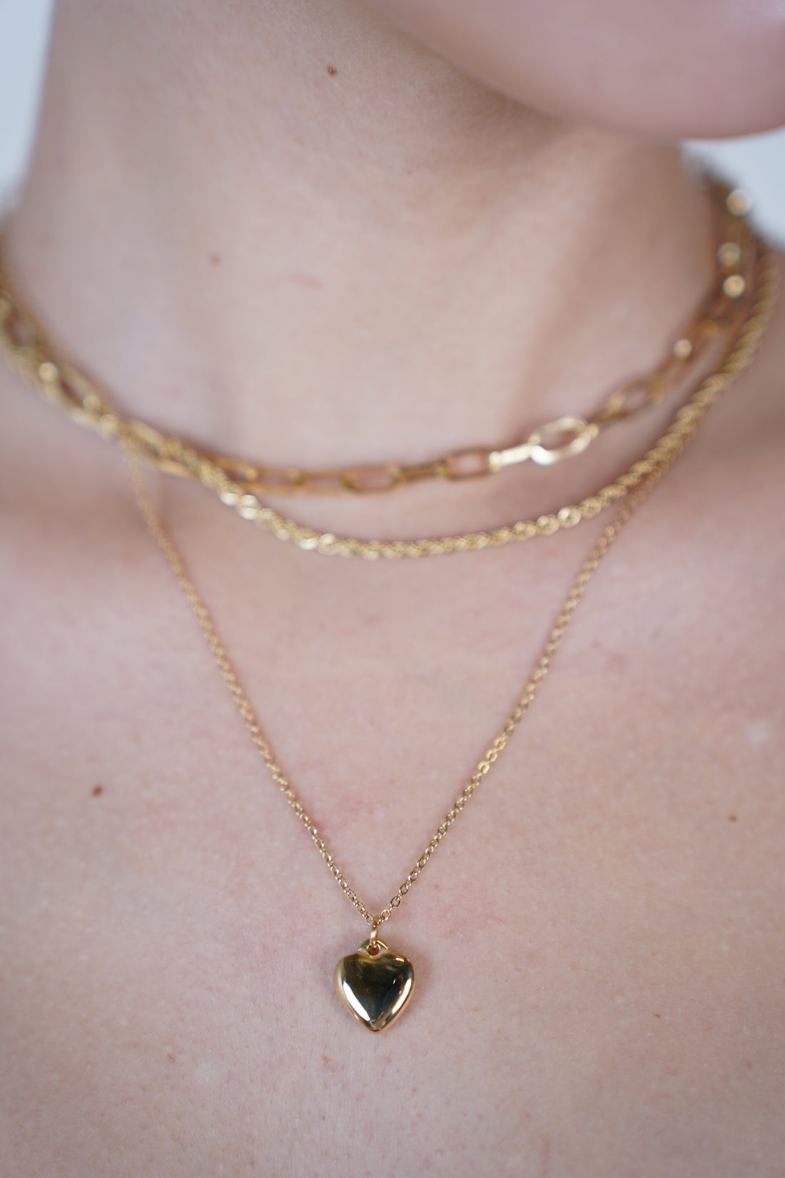Zuny Multi Necklace Set – Layered Gold Chains with Heart Accent