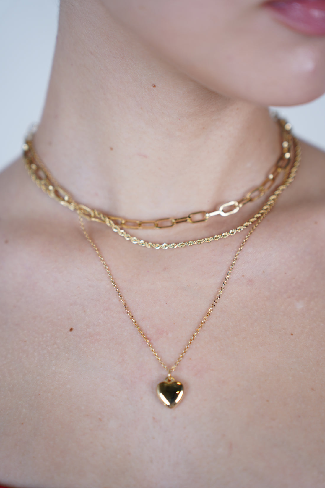 Zuny Multi Necklace Set – Layered Gold Chains with Heart Accent